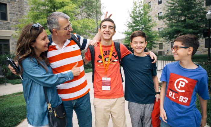 New Hokie student with their family at move in